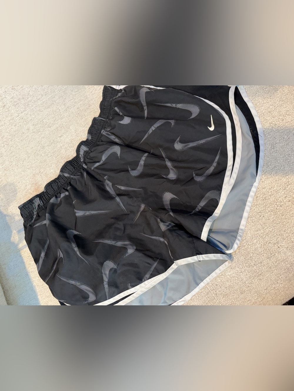 Nike Black Shorts with Gray Swoosh Print and White Trim